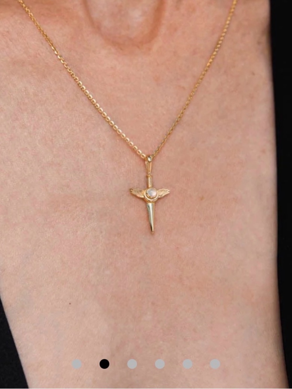Awe Inspired flying dagger amulet charm with moonstone